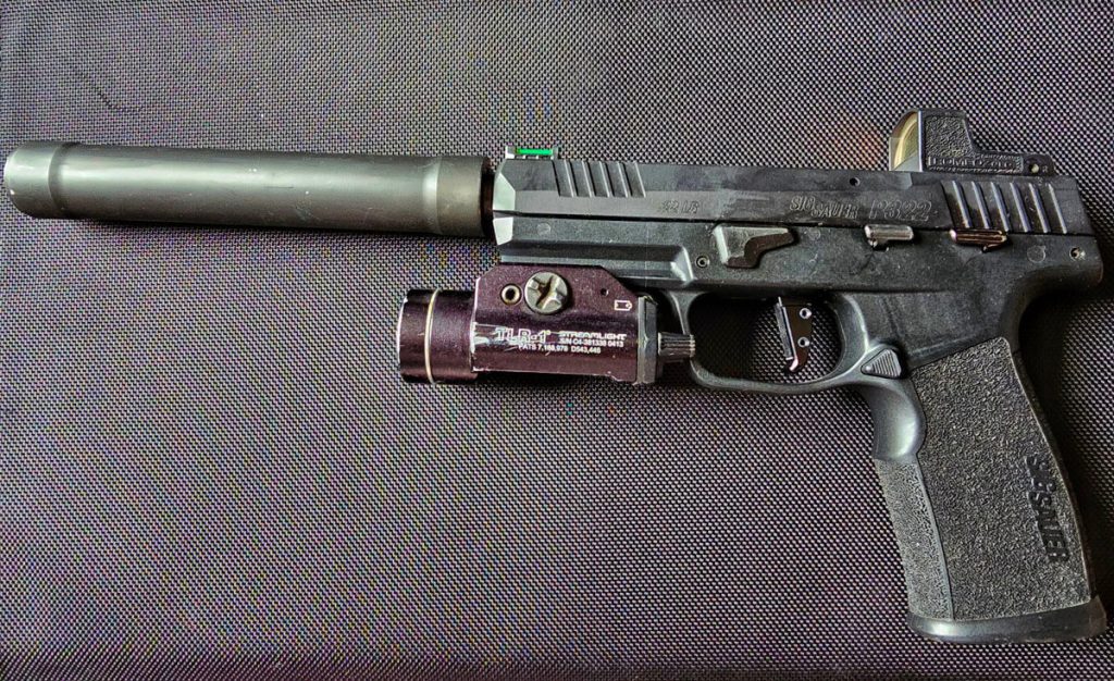 The SIG Sauer P322 with Romeo Zero Red Dot, Suppressor, TLR1 Light, and Suppressor