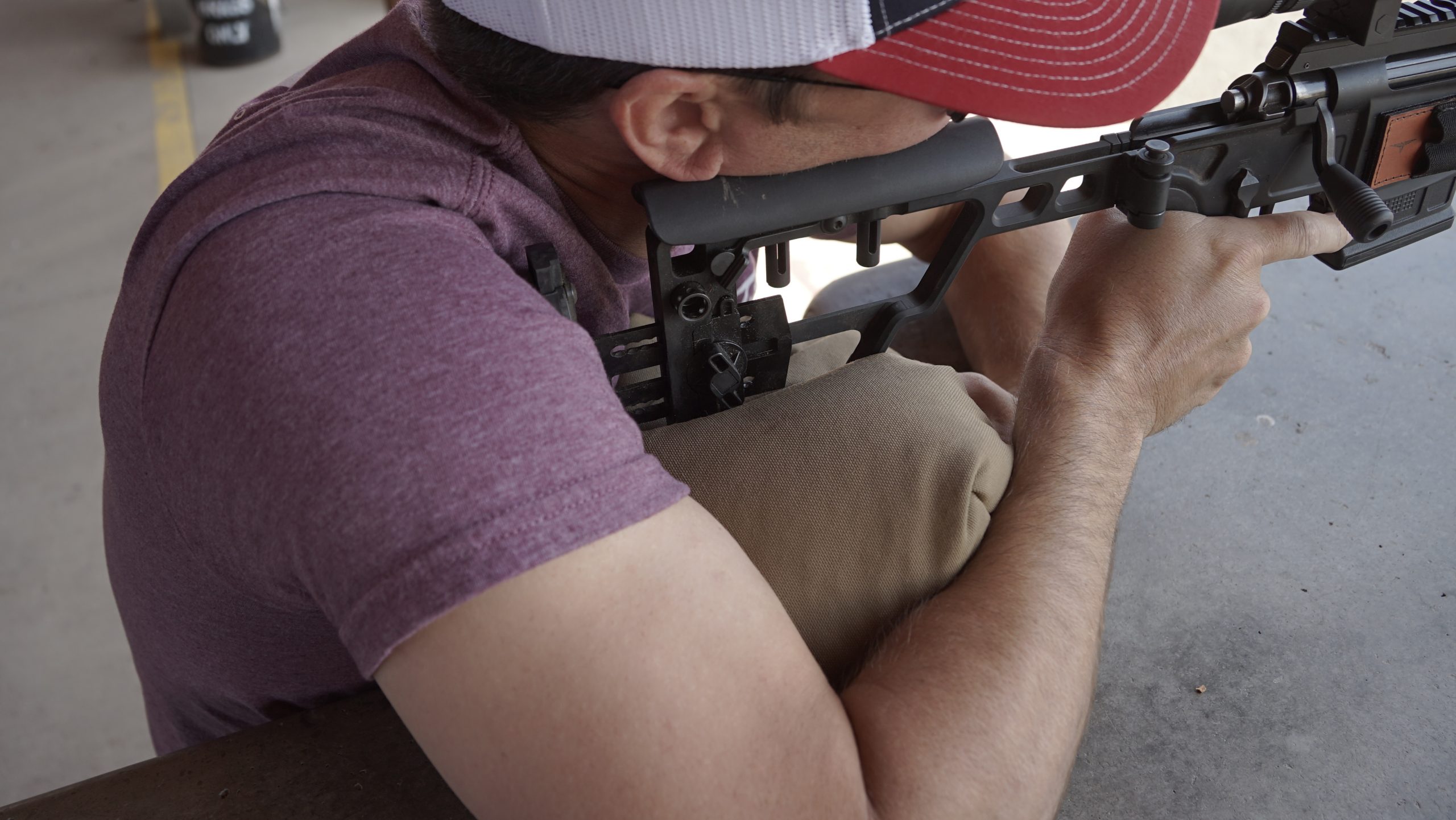 Hunter using shooting bag to stabilize rifle