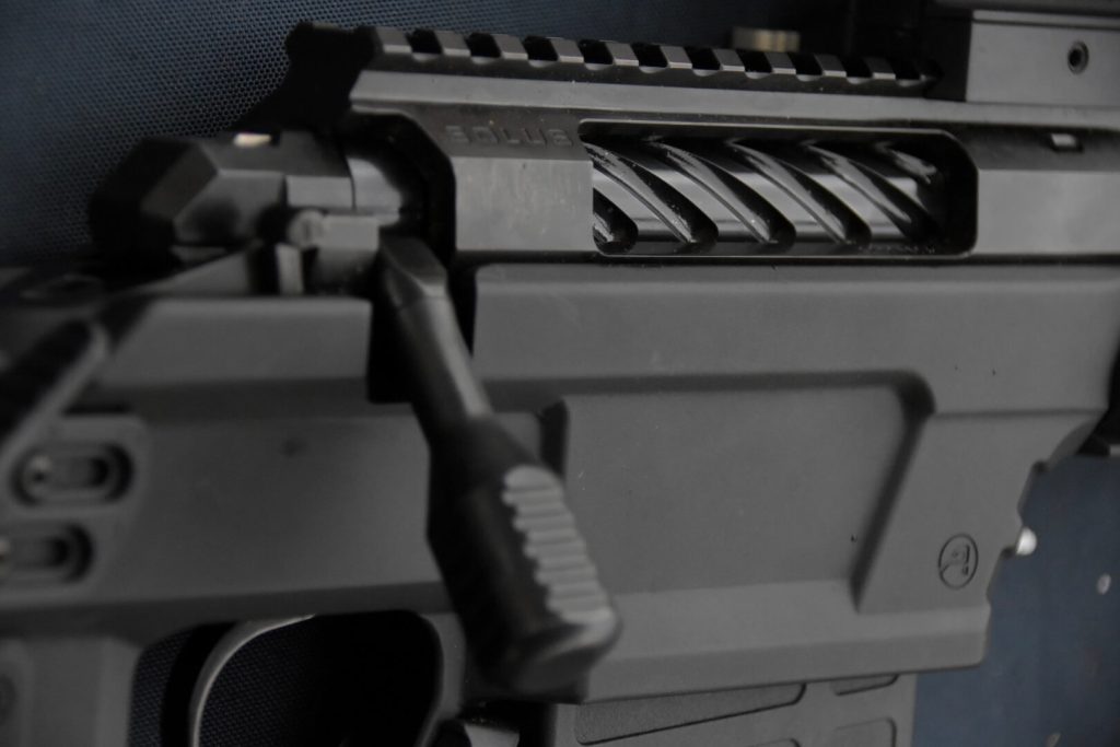 Closeup of a rifle action.