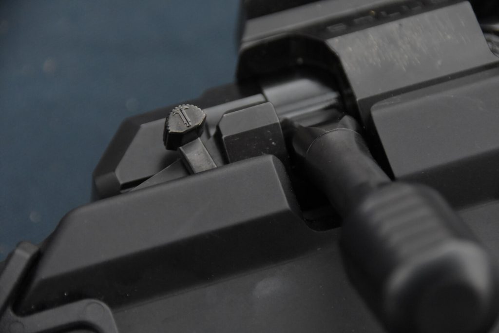 closeup of a rifle safety