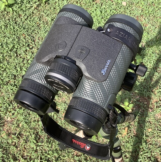 Burris binoculars on tripod outside with grass