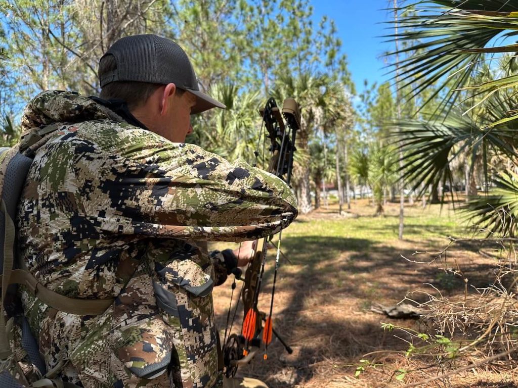 Hunter wearing the Sitka Equinox Guard Line while bow hunting