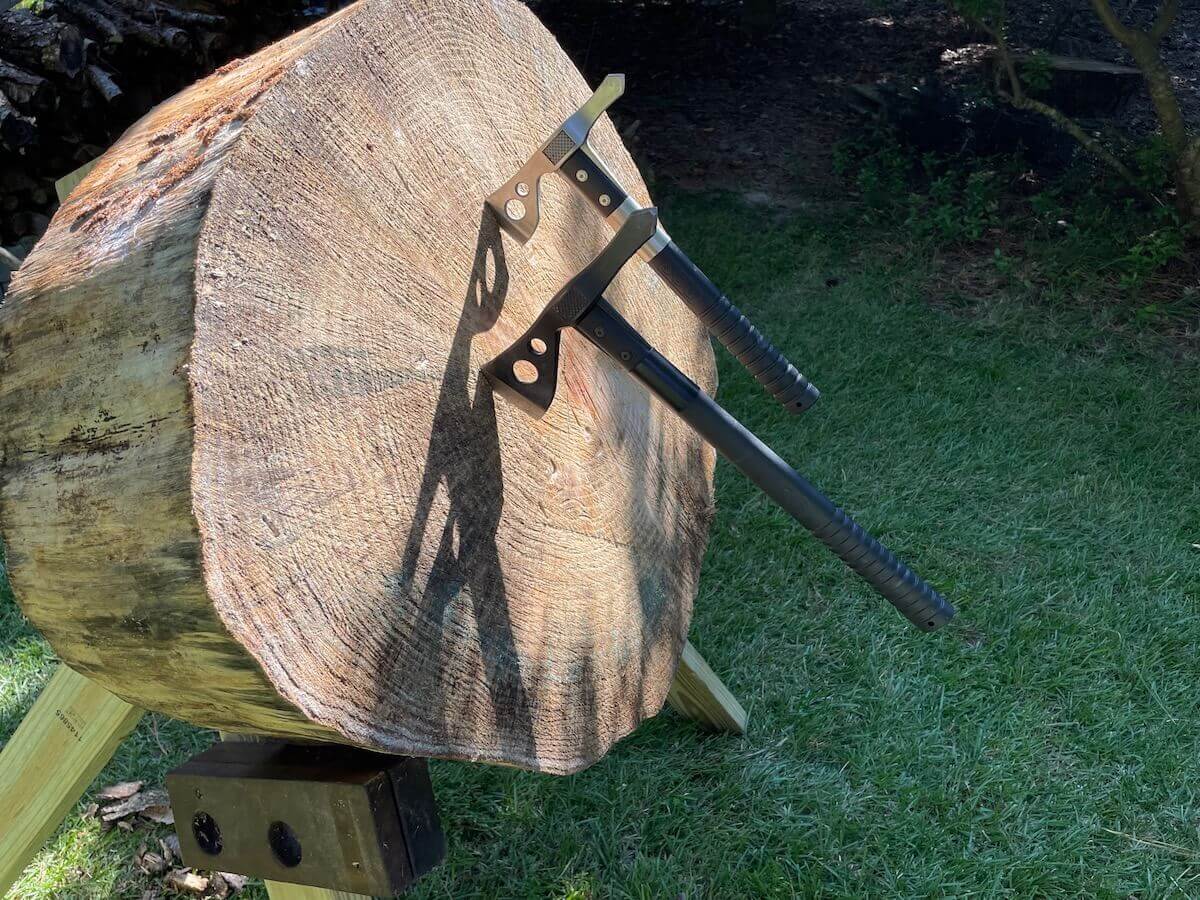 Target stand with two tomahawks lodged in the wood