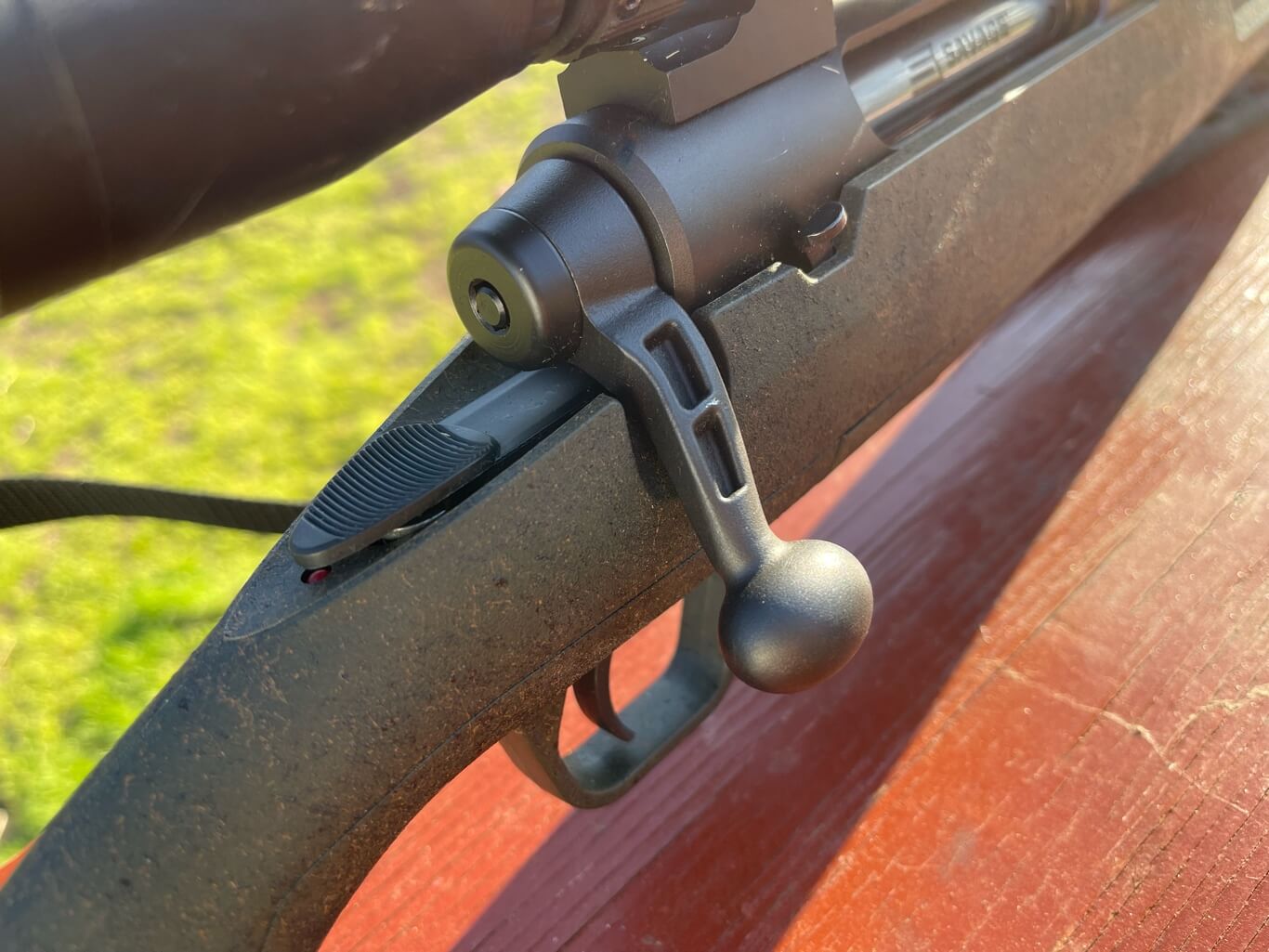 Savage Axis XP Rifle in 6.5 Creedmoor bolt handle and safety. 