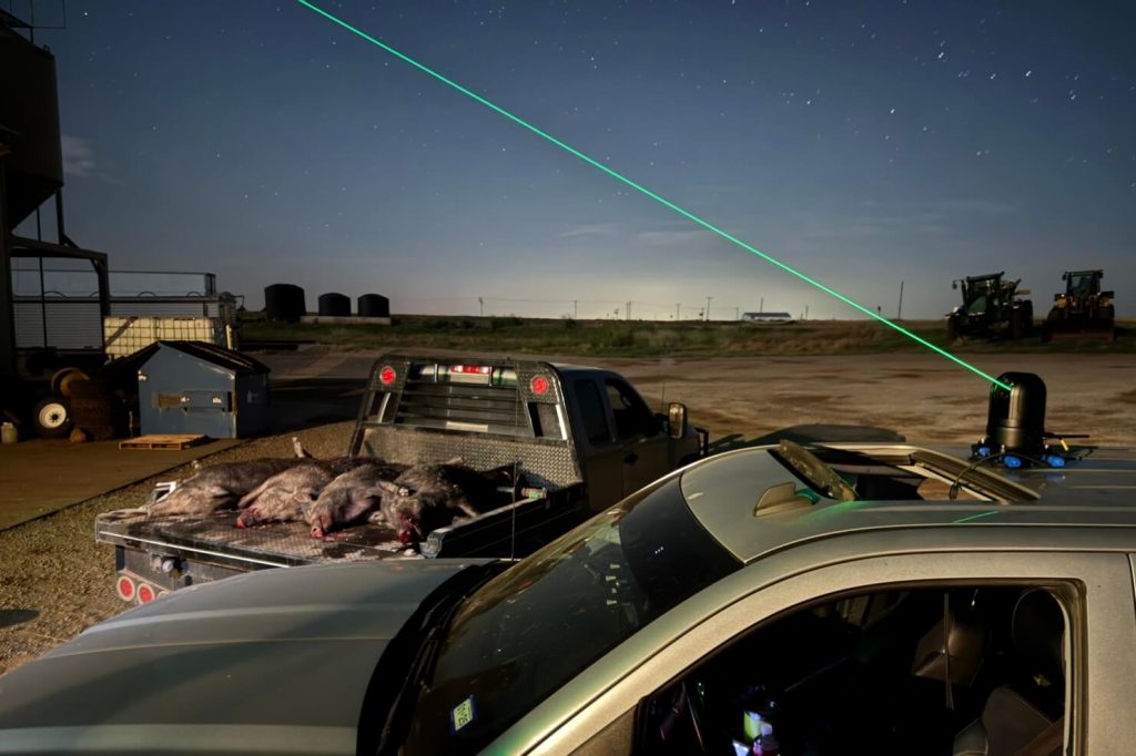 Green laser coming from thermal mounted to the top of a truck