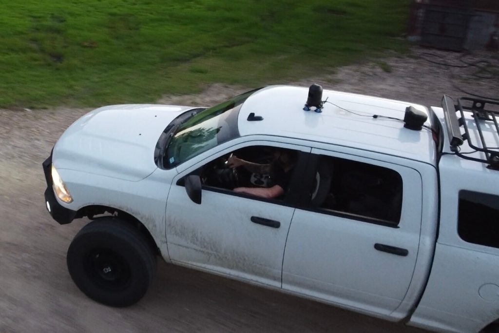 White diesel truck with thermal mounted to the top