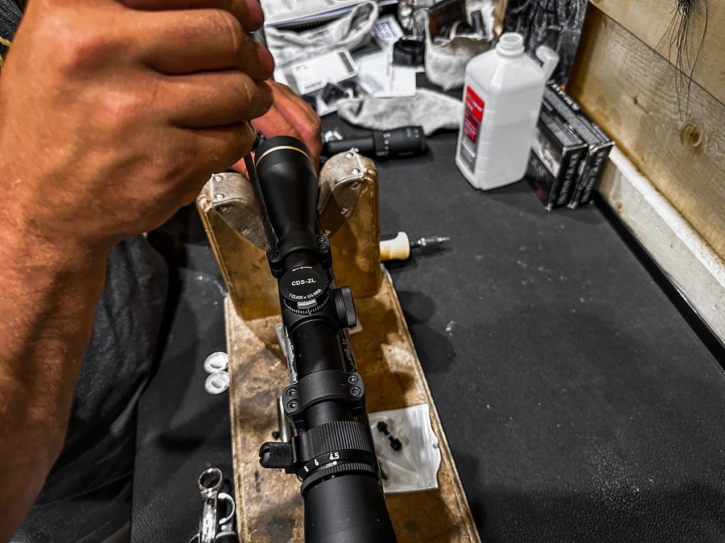 The 7mm PRC on the tool bench having a Leupold scope installed