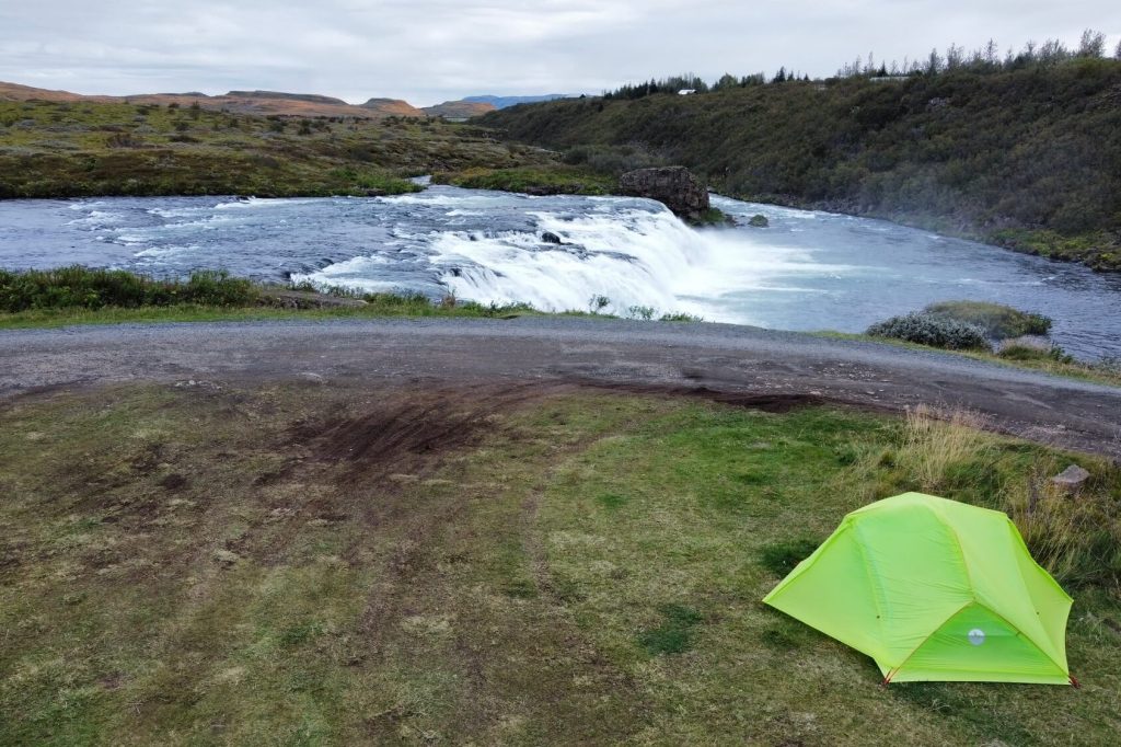 Marmot Superalloy 3P tent overlooking a waterfall in Iceland