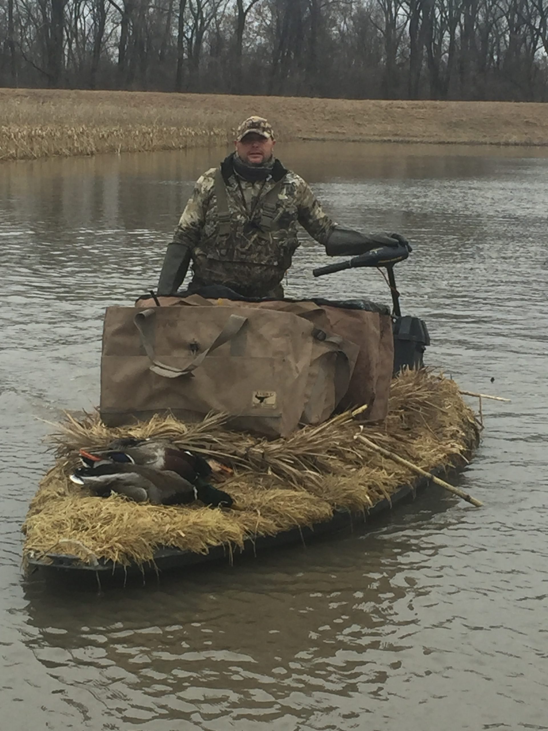 Hunter next to his gear boat