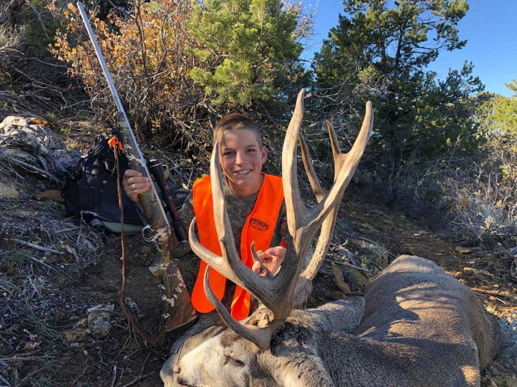 Take the Shot? A Young Hunter gets an Opportunity at a Magnificent Mule Deer Buck. It’s a long shot in challenging, windy conditions. Should he Take the Shot? - Presented by Badlands