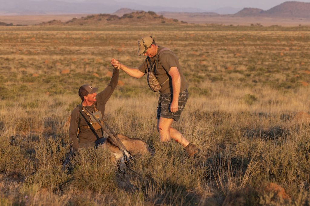 Hunters in field