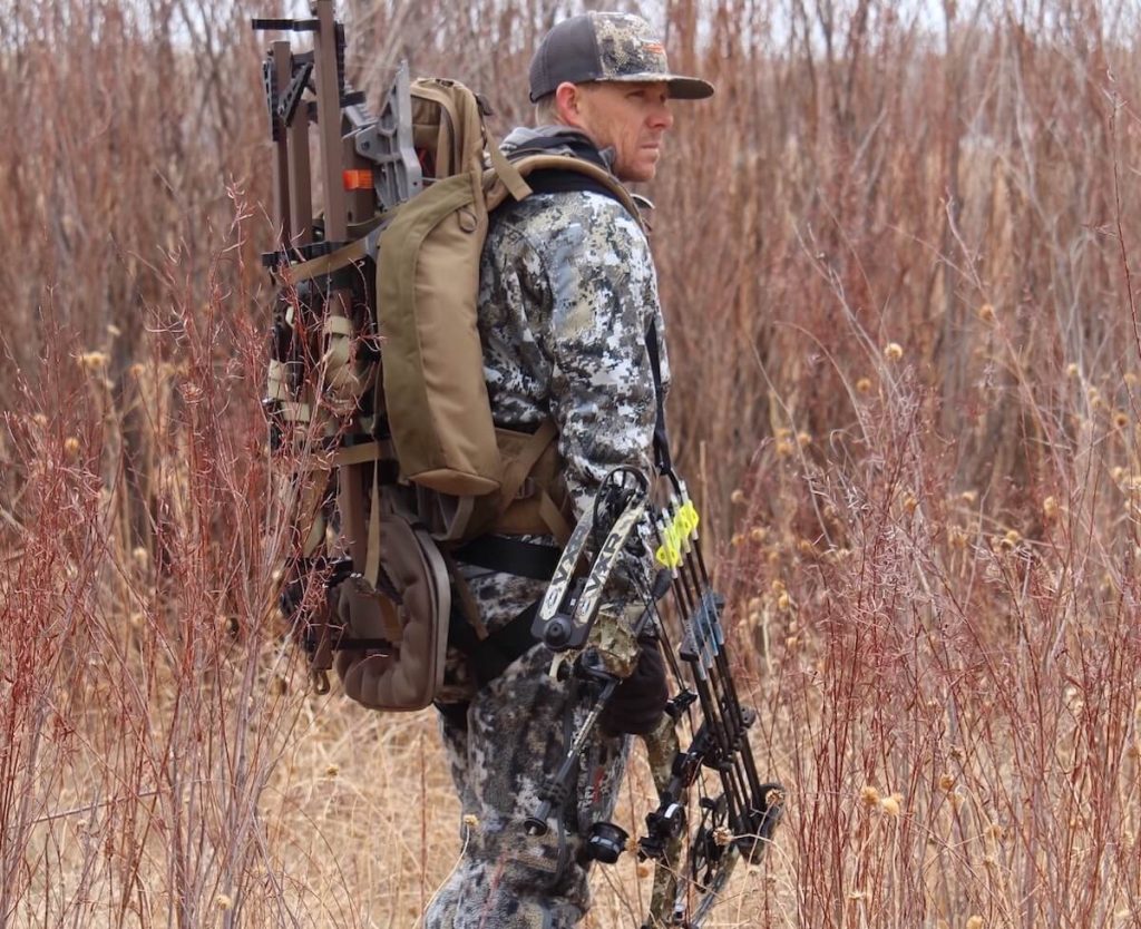 man bowhunting on public land